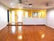 Spacious living room features hardwood floors, ceiling fans and natural light at 888 Forest Glen Rd, Clearwater, FL 33765