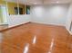 Spacious living room features hardwood floors and natural light at 888 Forest Glen Rd, Clearwater, FL 33765