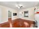 Bright living room featuring hardwood floors and access to another room at 931 28Th N Ave, St Petersburg, FL 33704