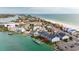 Beautiful waterfront townhomes with docks, showcasing stunning views of the bay and beach at 9939 1St E St, Treasure Island, FL 33706