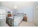 Charming bedroom with ceiling fan, natural light and nautical decor at 9939 1St E St, Treasure Island, FL 33706