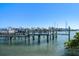 Well-maintained boat dock with multiple boat lifts, providing easy access to the open water for boating enthusiasts at 9939 1St E St, Treasure Island, FL 33706