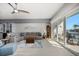 Bright living room offering a light color palette, modern furniture, sliding doors, and great natural light at 9939 1St E St, Treasure Island, FL 33706