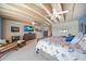 Bright main bedroom with beautiful vaulted ceiling, ceiling fans, furnishings, and decor at 9939 1St E St, Treasure Island, FL 33706