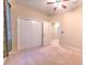 Bedroom featuring carpet and large closet at 10212 Holland Rd, Riverview, FL 33578