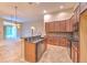 Kitchen with bar-style counter seating, stainless steel appliances, and an open view at 10212 Holland Rd, Riverview, FL 33578