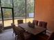 Screened patio with seating providing relaxing outdoor views at 10212 Holland Rd, Riverview, FL 33578