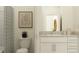 Bright bathroom featuring granite counters, decorative art, and a shower with a patterned curtain at 10820 Keato Beach Ct, Tampa, FL 33647
