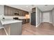 Bright kitchen with stainless steel appliances and marble countertops at 1200 Tarpon Woods Blvd # M8, Palm Harbor, FL 34685