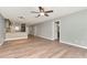 Bright living room showcasing modern flooring, open layout, and neutral paint, creating an airy atmosphere at 1200 Tarpon Woods Blvd # M8, Palm Harbor, FL 34685