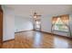 Spacious bedroom offers ample natural light, laminate floors, and neutral paint tones at 12371 Talpa St, Spring Hill, FL 34608