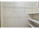Walk-in closet featuring wire shelves, offering ample storage space at 12371 Talpa St, Spring Hill, FL 34608