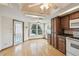 Kitchen nook with lots of natural light and view to the screened in pool area at 12371 Talpa St, Spring Hill, FL 34608