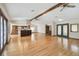 Open living space with kitchen, hardwood floors, and lots of natural light at 12371 Talpa St, Spring Hill, FL 34608