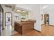 Wet bar with sink and shelving in open concept home at 12371 Talpa St, Spring Hill, FL 34608