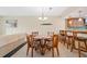Bright dining area featuring a round table with seating for four plus counter seating at 143 Lakeside Dr # 143, Oldsmar, FL 34677