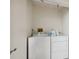 Convenient laundry room equipped with a washer and dryer set at 143 Lakeside Dr # 143, Oldsmar, FL 34677