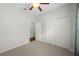 Empty bedroom with lots of closet space, light carpet, and gray walls at 1713 Trailwater St, Ruskin, FL 33570