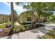 Charming one-story home featuring a well-maintained exterior with two-car garage and tropical landscaping at 1713 Trailwater St, Ruskin, FL 33570