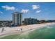 Aerial view of condo building, beach and shoreline at 17408 Gulf Blvd # 203, Redington Shores, FL 33708