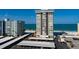 Coastal condominium featuring beach access, covered parking, and partial water views at 17408 Gulf Blvd # 203, Redington Shores, FL 33708