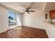 Bright living area boasts hardwood floors and sliding glass doors to a balcony with a beautiful ocean view at 17408 Gulf Blvd # 203, Redington Shores, FL 33708