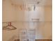 Walk-in closet providing ample storage space with wire shelving and clear plastic storage boxes at 17408 Gulf Blvd # 203, Redington Shores, FL 33708