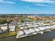 Aerial view of a waterfront residential neighborhood with canals and easy water access at 18675 Us Highway 19 N # 261, Clearwater, FL 33764