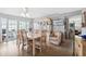 Inviting dining room featuring a classic china cabinet and light wood flooring with ample natural light at 18675 Us Highway 19 N # 261, Clearwater, FL 33764