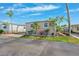 Charming single-story home with covered parking and well-manicured landscaping at 18675 Us Highway 19 N # 261, Clearwater, FL 33764
