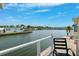 Scenic waterfront view from the patio, showcasing serene water and neighboring houses in this peaceful residential community at 18675 Us Highway 19 N # 261, Clearwater, FL 33764