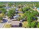 Aerial view of a neighborhood featuring tree-lined streets and cozy single-Gathering homes at 2018 21St S St, St Petersburg, FL 33712