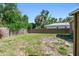 A spacious backyard is enclosed by a wooden fence at 2018 21St S St, St Petersburg, FL 33712
