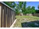 Backyard features an outdoor shed and privacy fence at 2018 21St S St, St Petersburg, FL 33712