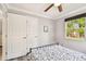The bedroom features wood-look floors and bright window at 2018 21St S St, St Petersburg, FL 33712