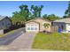 Charming home with a well-maintained yard, ample parking, and a small palm at 2018 21St S St, St Petersburg, FL 33712