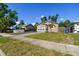 Cozy home with a well-kept lawn and a paved driveway at 2018 21St S St, St Petersburg, FL 33712