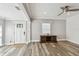 Comfortable front entrance with hardwood floors, paneled door, and media console at 2018 21St S St, St Petersburg, FL 33712