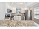 Bright kitchen features stainless appliances, granite countertops, and subway tile backsplash at 2018 21St S St, St Petersburg, FL 33712