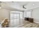 Open-concept living room featuring hardwood floors, abundant light and stylish furniture at 2018 21St S St, St Petersburg, FL 33712
