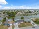 This aerial view highlights the waterfront community and tranquil setting at 2252 Society Dr, Holiday, FL 34691