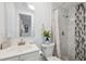 This bathroom features updated fixtures, including the shower and vanity at 2252 Society Dr, Holiday, FL 34691