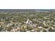 Expansive aerial shot of a residential area with mature trees and conveniently located in Sarasota, Florida at 2626 Cheryle Ln, Sarasota, FL 34237