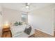 Comfortable bedroom with a queen-sized bed and ample natural light from the window at 2626 Cheryle Ln, Sarasota, FL 34237