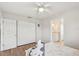 Bedroom featuring a queen-sized bed, closet, and access to an en suite bathroom at 2626 Cheryle Ln, Sarasota, FL 34237