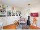 Inviting bedroom with built-in shelving, natural light, and hardwood floors at 2627 8Th N Ave, St Petersburg, FL 33713