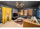 This living room features tile flooring, a modern light fixture, and ample space for relaxation and entertainment at 2627 8Th N Ave, St Petersburg, FL 33713