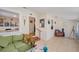 Inviting living room with a cozy green sofa and open access to other rooms at 2627 8Th N Ave, St Petersburg, FL 33713