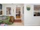 Bright living room with open floor plan and view to another room with built-in shelving at 2627 8Th N Ave, St Petersburg, FL 33713