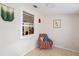 Cozy sitting area with natural light, colorful decor, and tiled flooring for a cheerful ambiance at 2627 8Th N Ave, St Petersburg, FL 33713